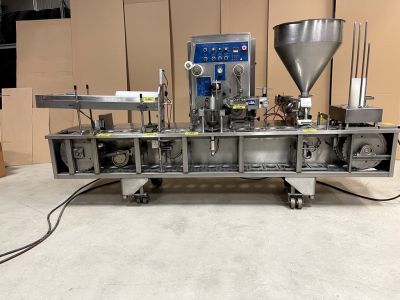 used holmatic cup filler with sealing system model pr-1
